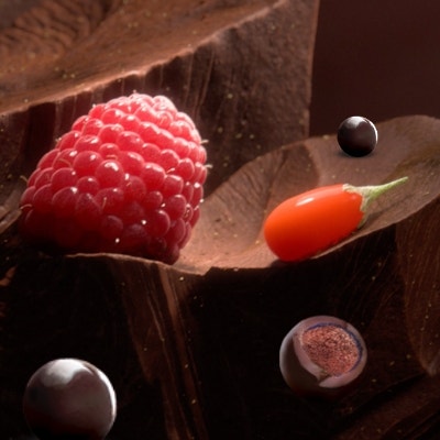 Dark chocolate filled with Raspberry & Goji flavor on the inside